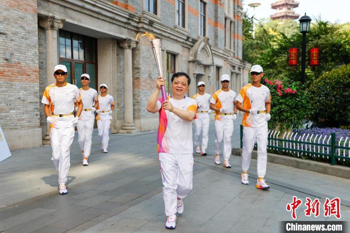 （微观亚运）述评：浙江温州亚运“薪火”相传 亦是温商精神的传递